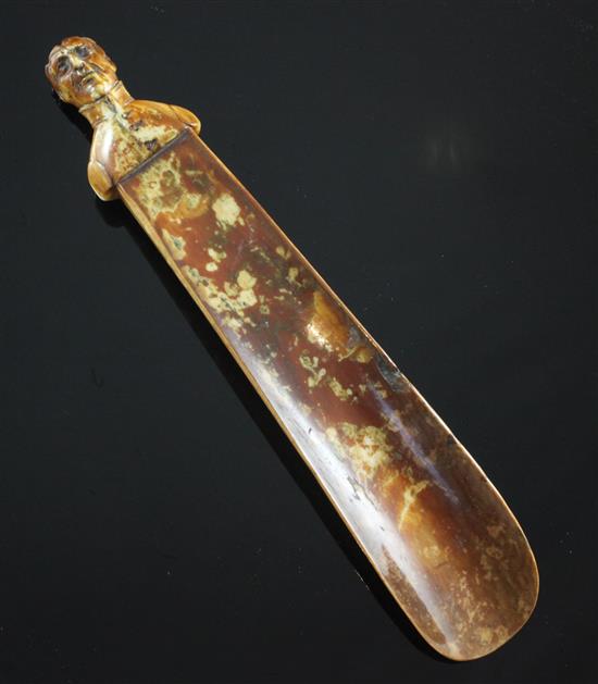 An early 19th century ivory shoe horn, 6.25in.